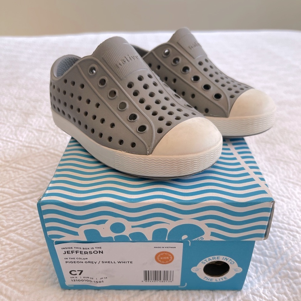 New in box. Native shoes. Toddler size 7. Pigeon grey/white